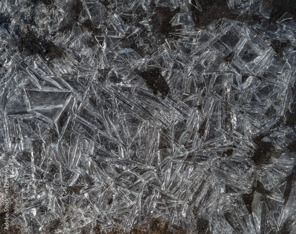 A patch of crystalline, frozen water on a stream in the Eastern Sierra Nevada area. A patch of crystalline, frozen water on a stream in the Eastern Sierra Nevada area.