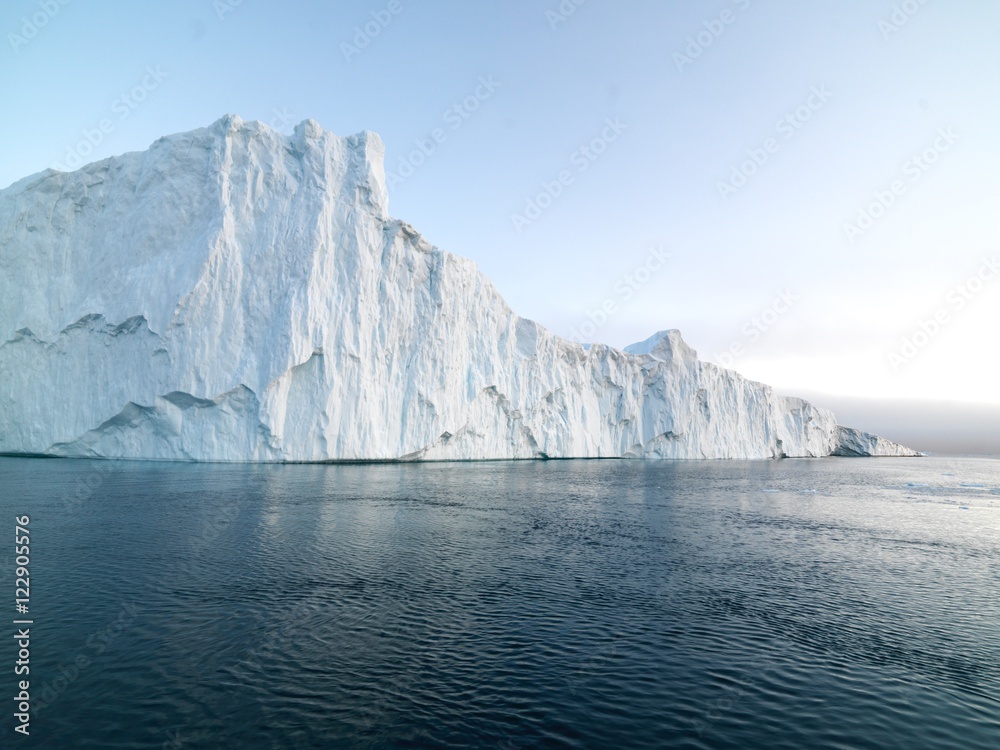 Big icebergs are ont he arctic ocean in Greenland Big icebergs are ont he arctic ocean in Greenland