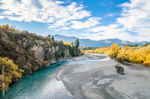 Beautiful view from the Historic Bridge over Shotover River in Arrowtown, New Zealand. photo