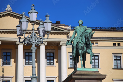The Royal Palace and statue of King Karl Johan XIV in Oslo, Norw photo