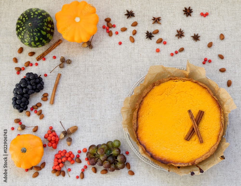 Fresh orange homemade pumpkin pie on rustic table, Thanksgiving. Fresh orange homemade pumpkin pie on rustic table, Thanksgiving.