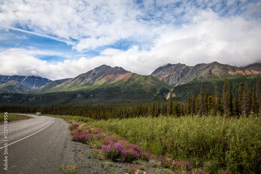 North of Haines Junction heading towards Kluane Lake- Yukon Territory- Canada  This section of the Alaska Highway is spectacular: mountains to the west, Kluane Lake to the east.