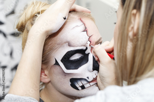 the process of creating makeup for Halloween