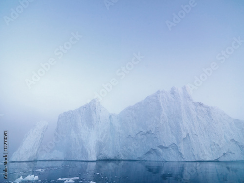 huge icebergrs are on the arctic ocean at Greenland