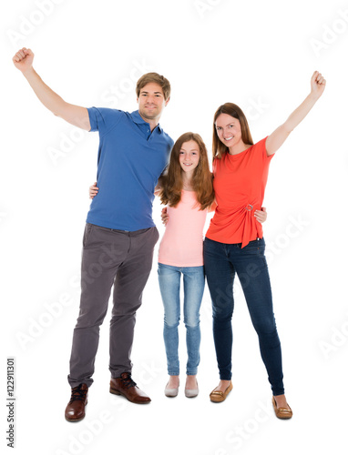 Happy Family Raising Their Arms