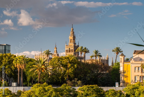 Giralda Spire Bell Tower of Seville Cathedral, Cathedral of Saint Mary of the See Church of El Salvador Seville, Andalusia Spain.The largest Gothic Cathedral in the World. photo