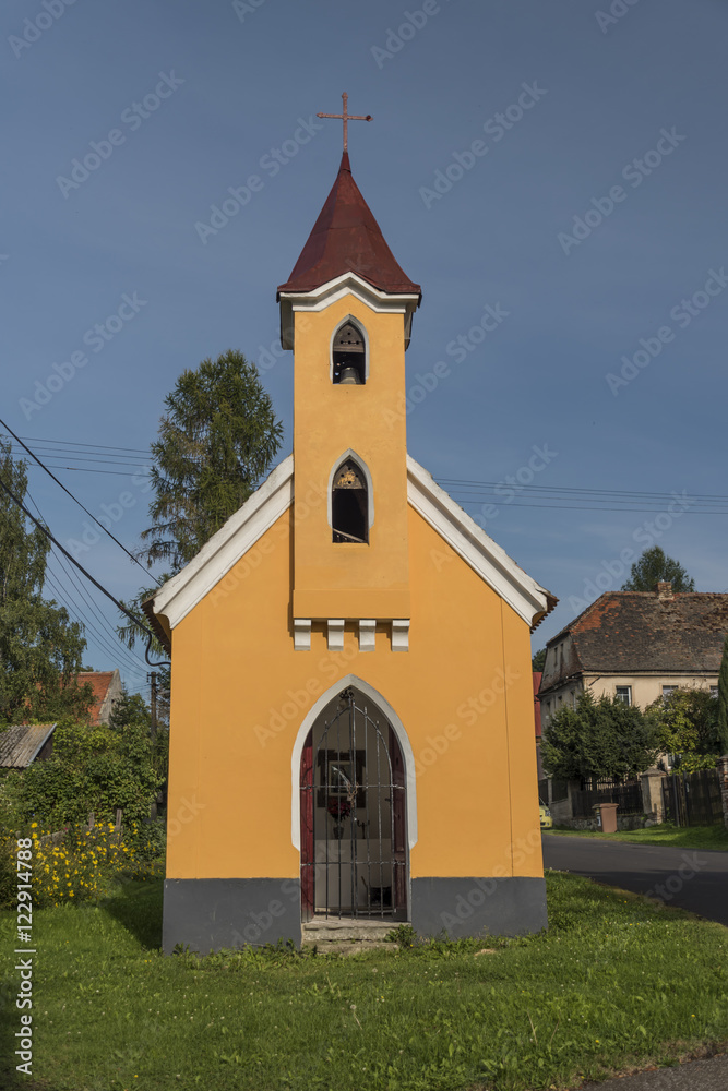 Yellow chapel in Sucha village