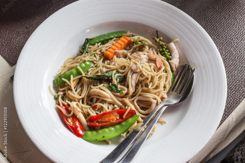 Spicy Spagetti in white dish,Thailand food Spicy Spagetti in white dish,Thailand food