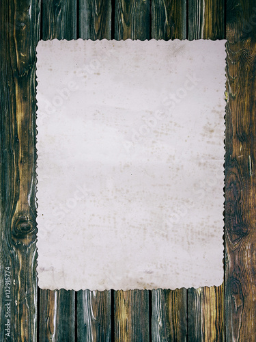 paper on wooden background