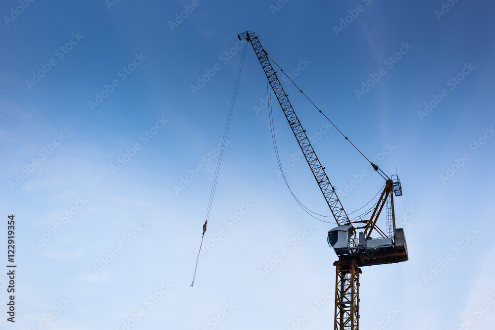 Tower Crane with clear blue sky.