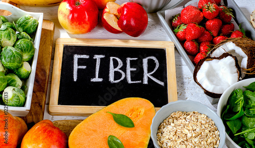 High Fiber Foods on a white wooden background.