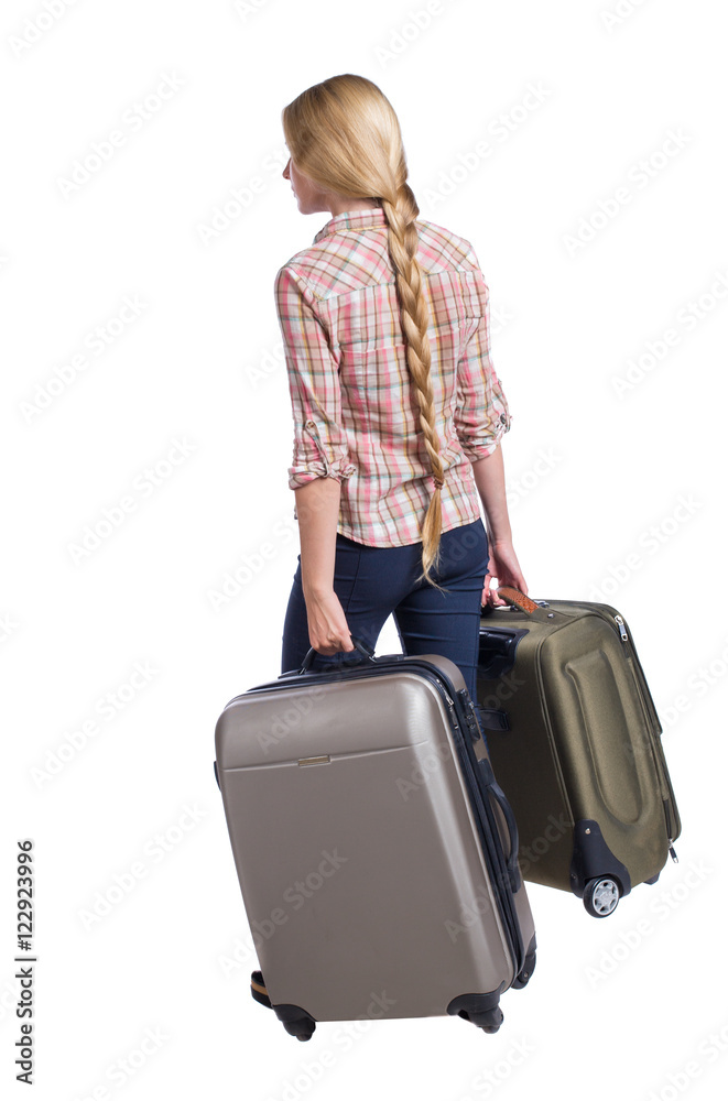 back view of walking woman with suitcase. beautiful girl in motion. backside view of person. Rear view people collection. Isolated over white background. Girl with very long hair goes with back view of walking woman with suitcase. beautiful girl in motion. backside view of person. Rear view people collection. Isolated over white background. Girl with very long hair goes with