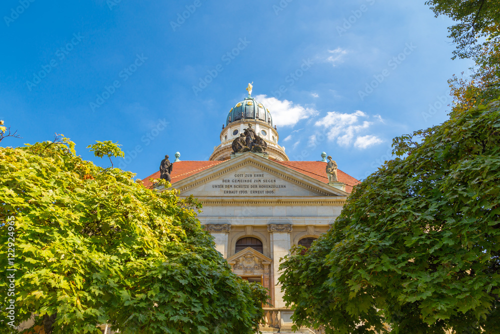 Obraz premium French Cathedral between trees.
