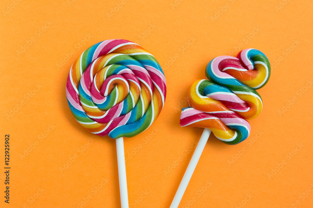 Two lollipops with many colors in a spiral Two lollipops with many colors in a spiral
