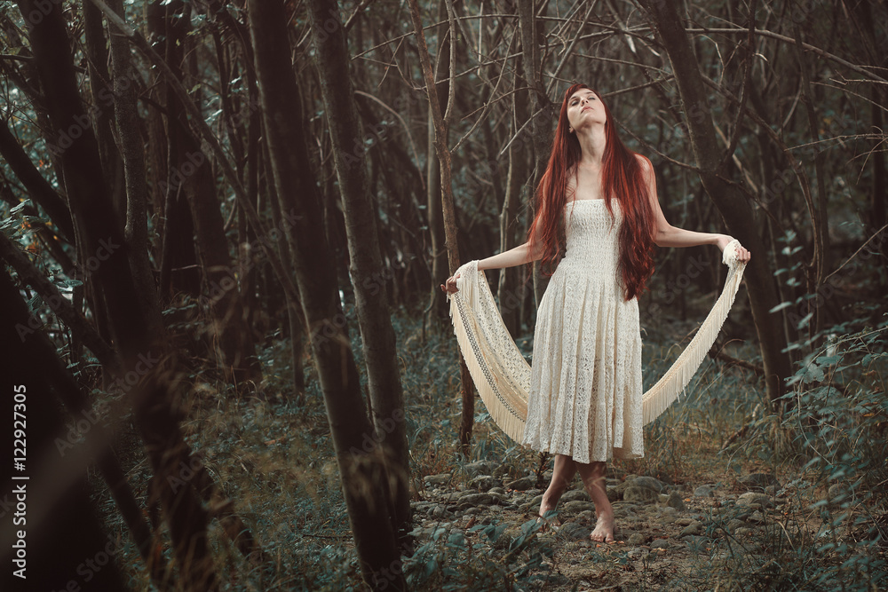 Fototapeta premium Woman dancing in secret forest