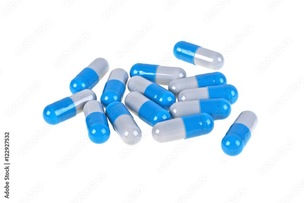 Pills. Tablets. Capsule. Close-up of pile of colored tablets on
