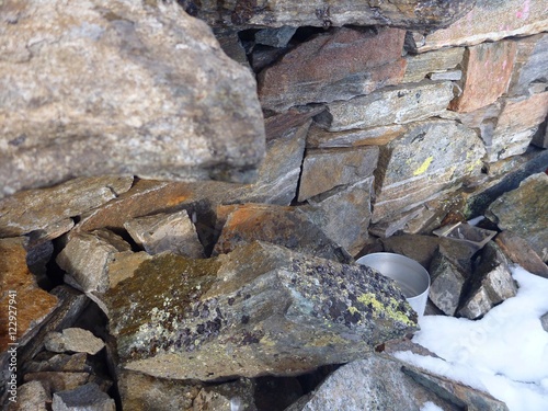 outdoor cooking with alumunium pot on a mountain hut photo