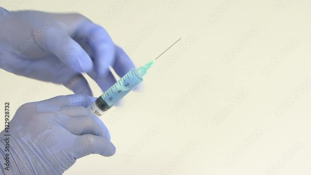 Doctor preparing Syringe Healthcare and medicine Doctor preparing Syringe Healthcare and medicine