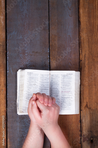 The prayer on the Bible. 