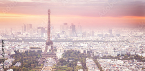 Sunset Eiffel tower and Paris city view form Montparnasse. Sunset romantic background. Eiffel Tower from Champ de Mars, Paris, France. © Kotkoa