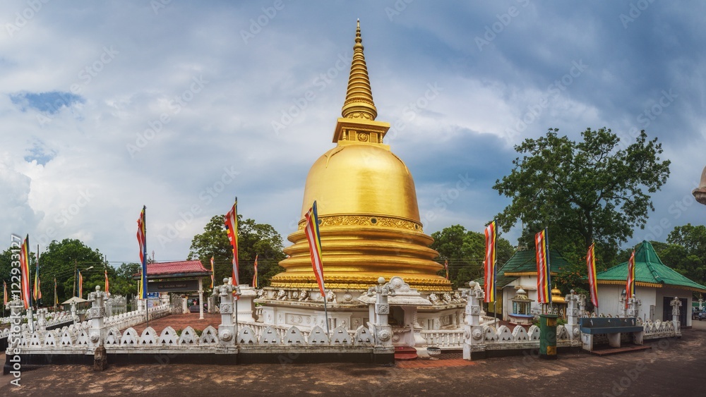 Naklejka premium A Dagoda (Stupa) at Golden Temple of Dambulla, Sri Lanka