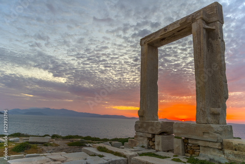 Amazing sunset in Naxos, Cyclades, Greece. The incredible gate (