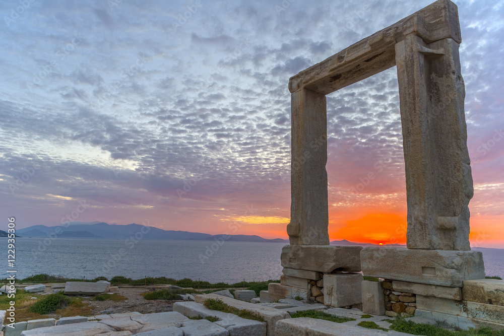 Amazing sunset in Naxos, Cyclades, Greece. The incredible gate (