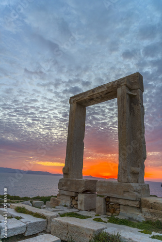 Amazing sunset in Naxos, Cyclades, Greece. The incredible gate (