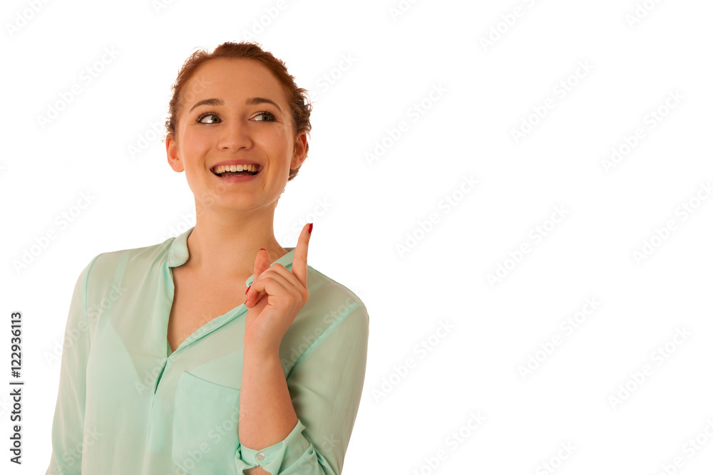 Business woman pointing to copy space while presenting a product Business woman pointing to copy space while presenting a product