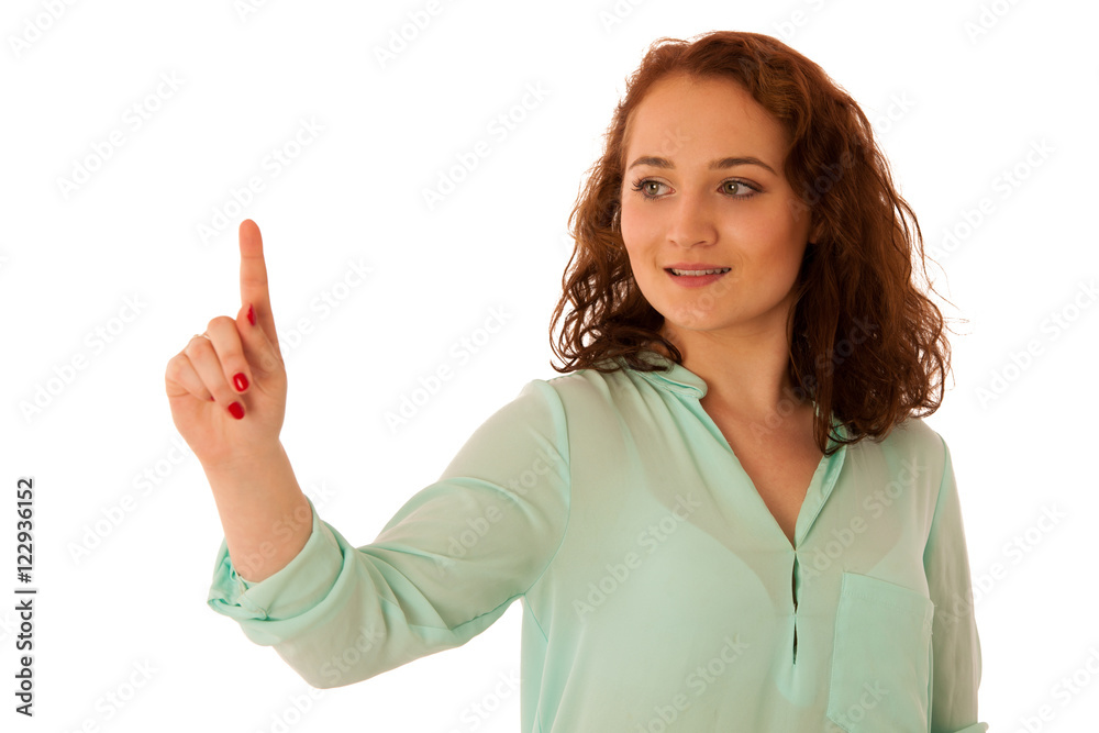 Business woman pointing to copy space while presenting a product Business woman pointing to copy space while presenting a product