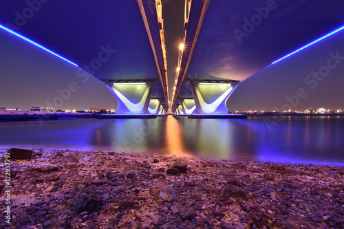 Photography Garhoud Bridge from base at night with long exposure, Dubai, UAE
