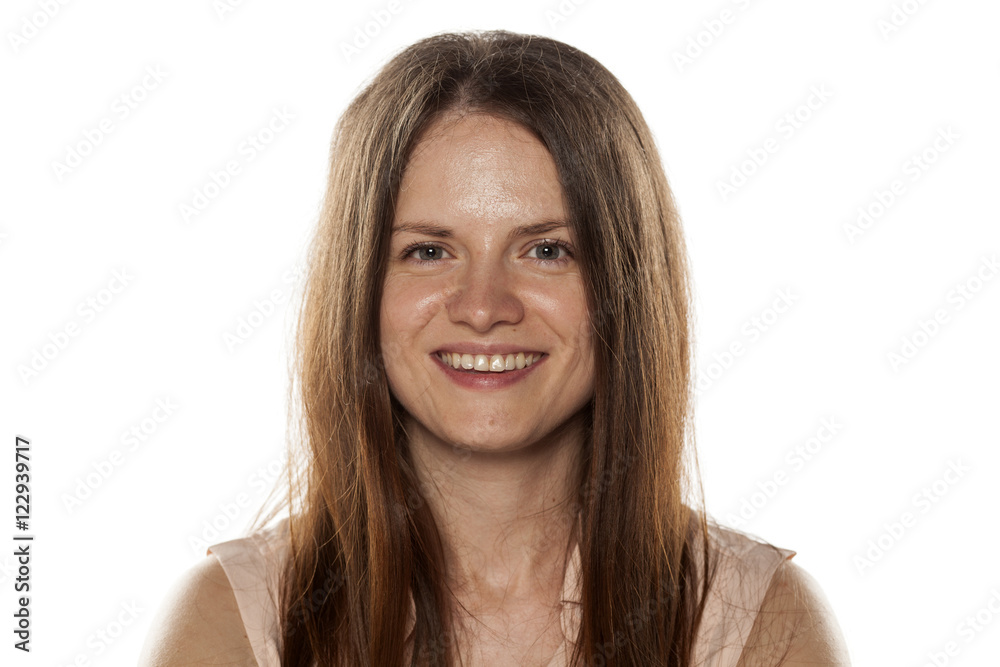 Portrait of a smiling young woman without makeup Portrait of a smiling young woman without makeup