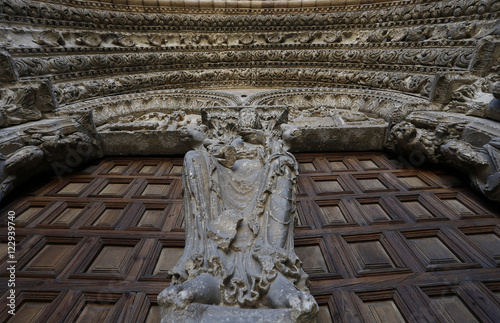 Portada occidental de La basílica de los Santos Hermanos Mártires, Vicente, Sabina y Cristeta,  San Vicente,  templo románico de Ávila, España photo