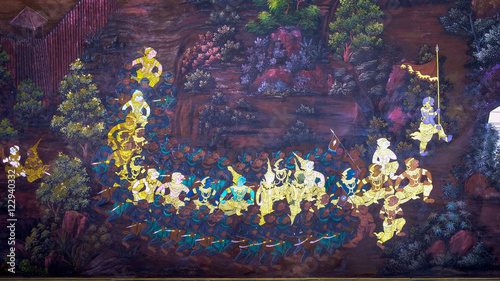 Photography Masterpiece of traditional Thai style painting art old (1931) of Ramayana story on the temple wall of famous Wat Phra Kaew in Bangkok, Thailand