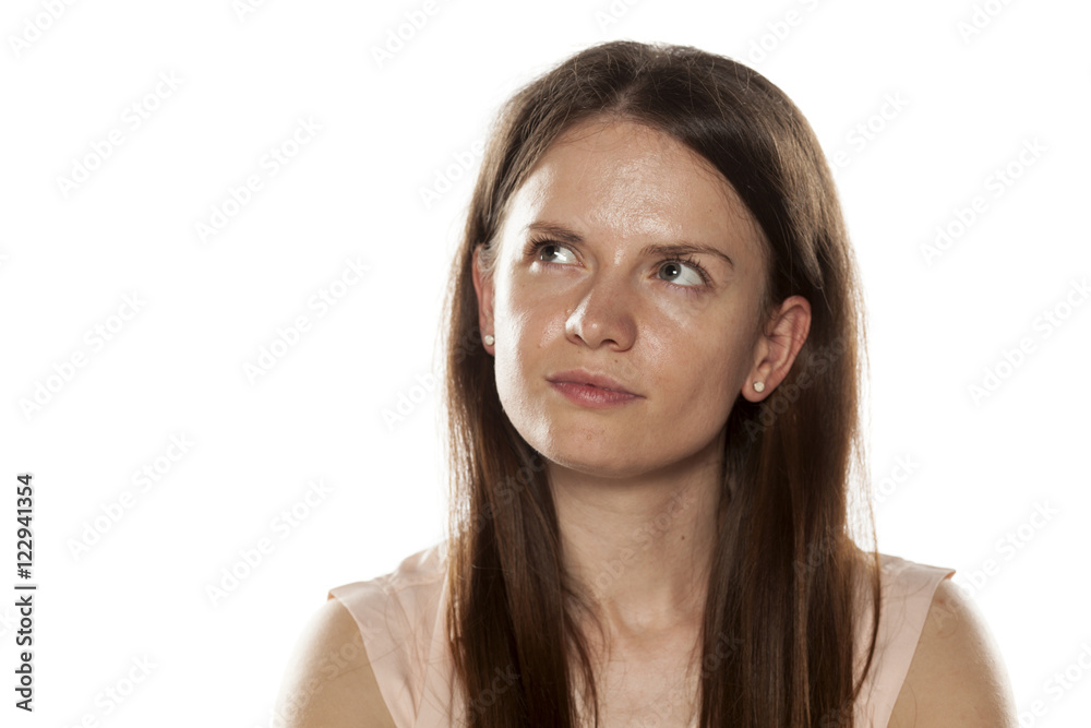 Portrait of a young woman without makeup looking up Portrait of a young woman without makeup looking up