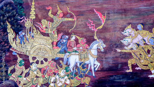 Masterpiece of traditional Thai style painting art old (1931) of Ramayana story on the temple wall of famous Wat Phra Kaew in Bangkok, Thailand..Photo taken on: Oct 6th, 2016