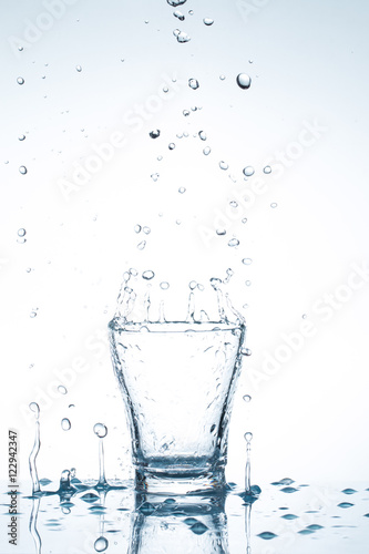 water splash in glasses isolated on white