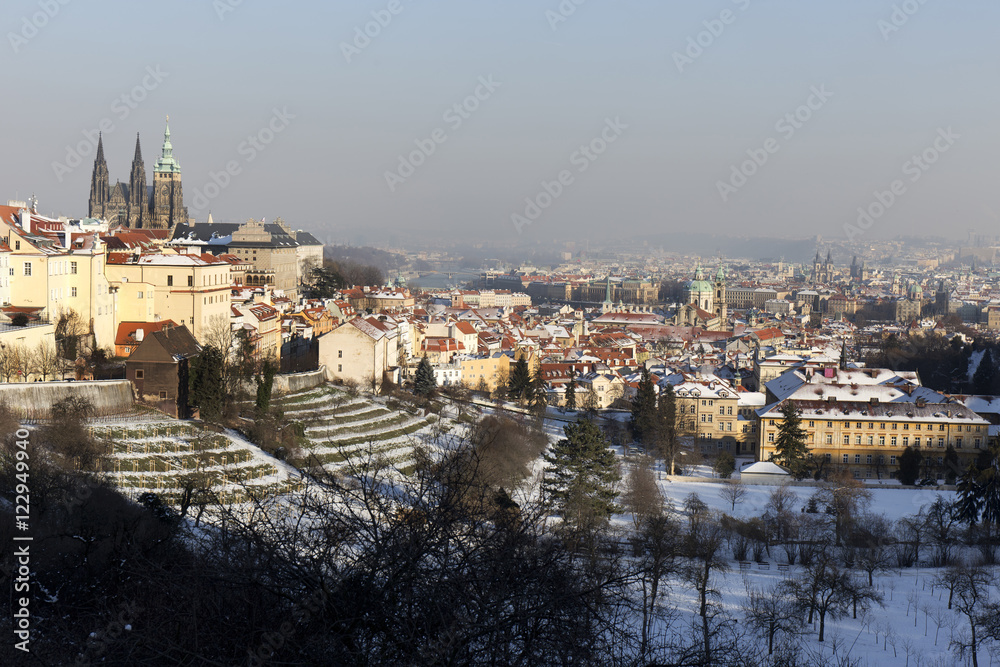 Snowy Prague City with gothic Castle  in the sunny Day, Czech Republic