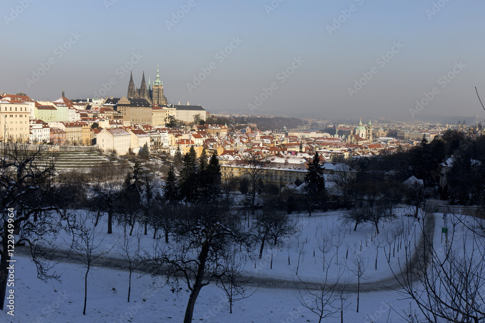 Snowy Prague City with gothic Castle  in the sunny Day, Czech Republic