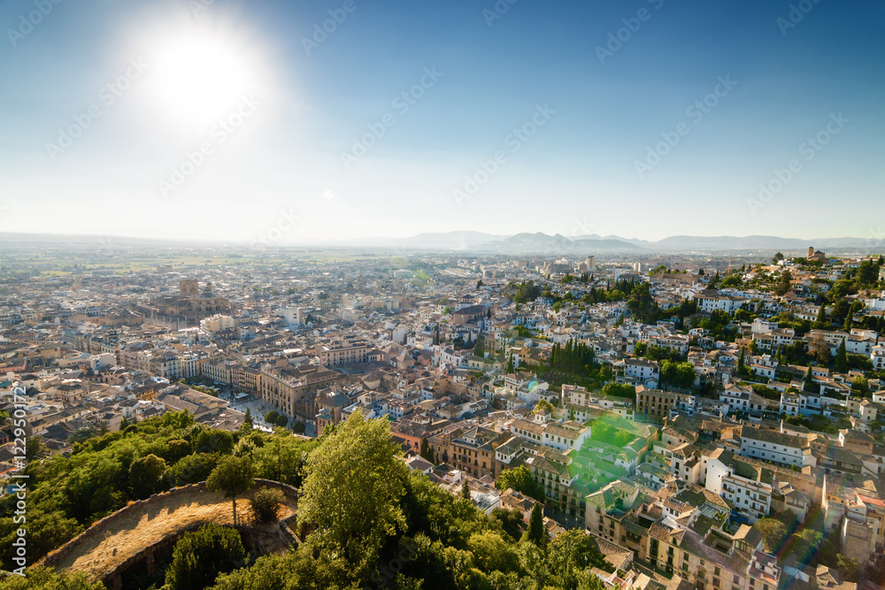 Sunny view of Granada from viewpoint of garden of Generalife, Andalusia province, Spain.