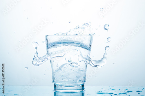 water splash in glasses isolated on white