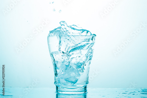 water splash in glasses isolated on white