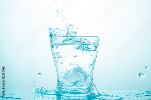 water splash in glasses isolated on white