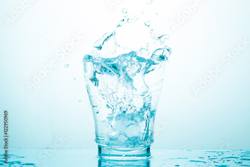 water splash in glasses isolated on white