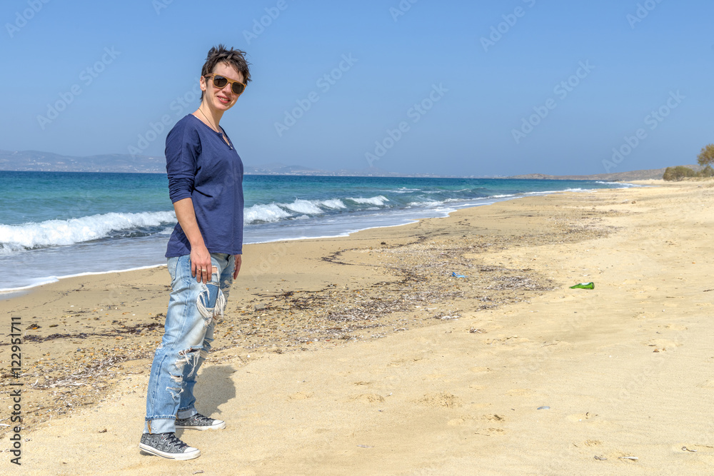Young woman on one of the most beautiful beaches in the world in