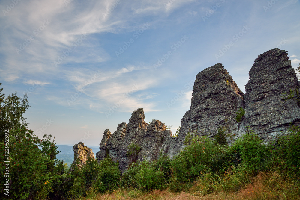 Amazing landscape with mountain range and beautiful blue sky, dragon backbone, Russia, Ural, Europe - Asia boundary Amazing landscape with mountain range and beautiful blue sky, dragon backbone, Russia, Ural, Europe - Asia boundary