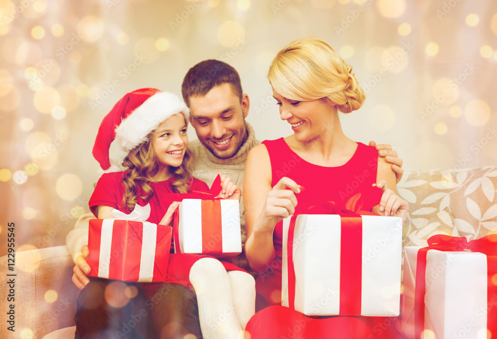 happy family opening gift boxes