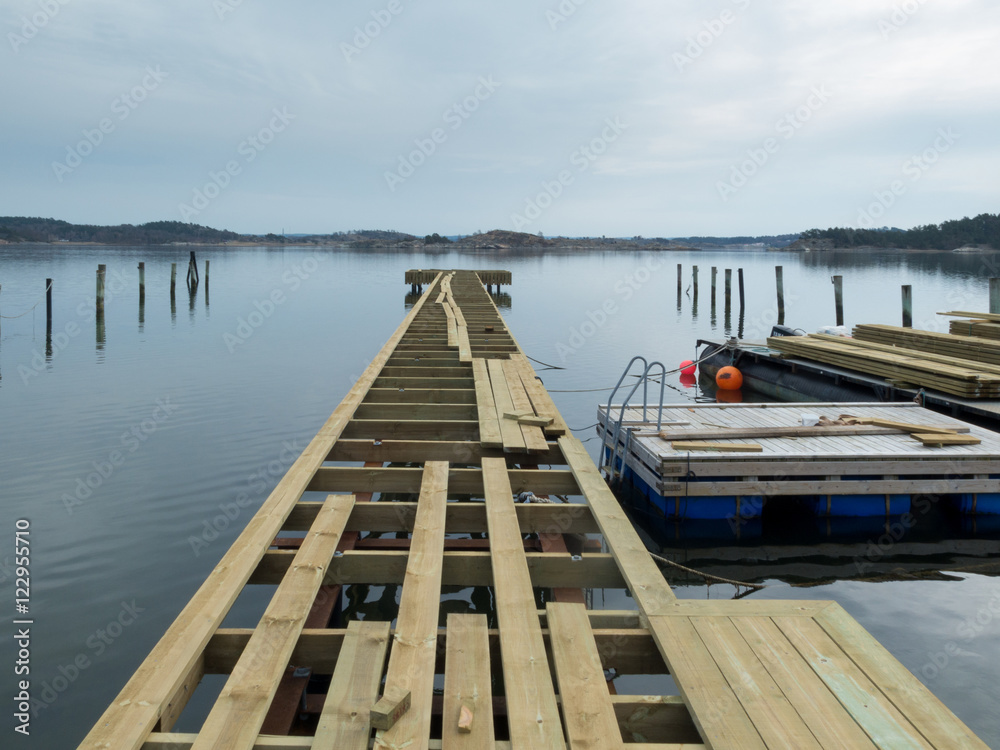 Naklejka premium building a new jetty for the boat