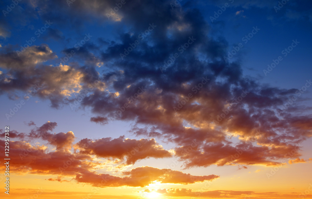 Fototapeta premium Colorful sky with clouds at sunset. Nature background.