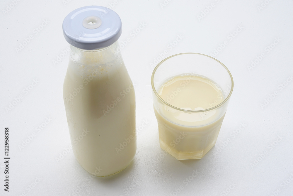 Soy milk in glass with soybeans. Food for health. Soy milk in glass with soybeans. Food for health.